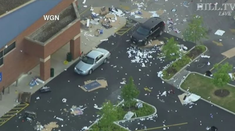 TheRoot's tweet photo. Chaos erupted in downtown Chicago overnight as hundreds of people took to the streets and dozens of stores, banks and other businesses were broken into and looted: https://t.co/tTtgbmESh3 https://t.co/TSMPmQr9cC