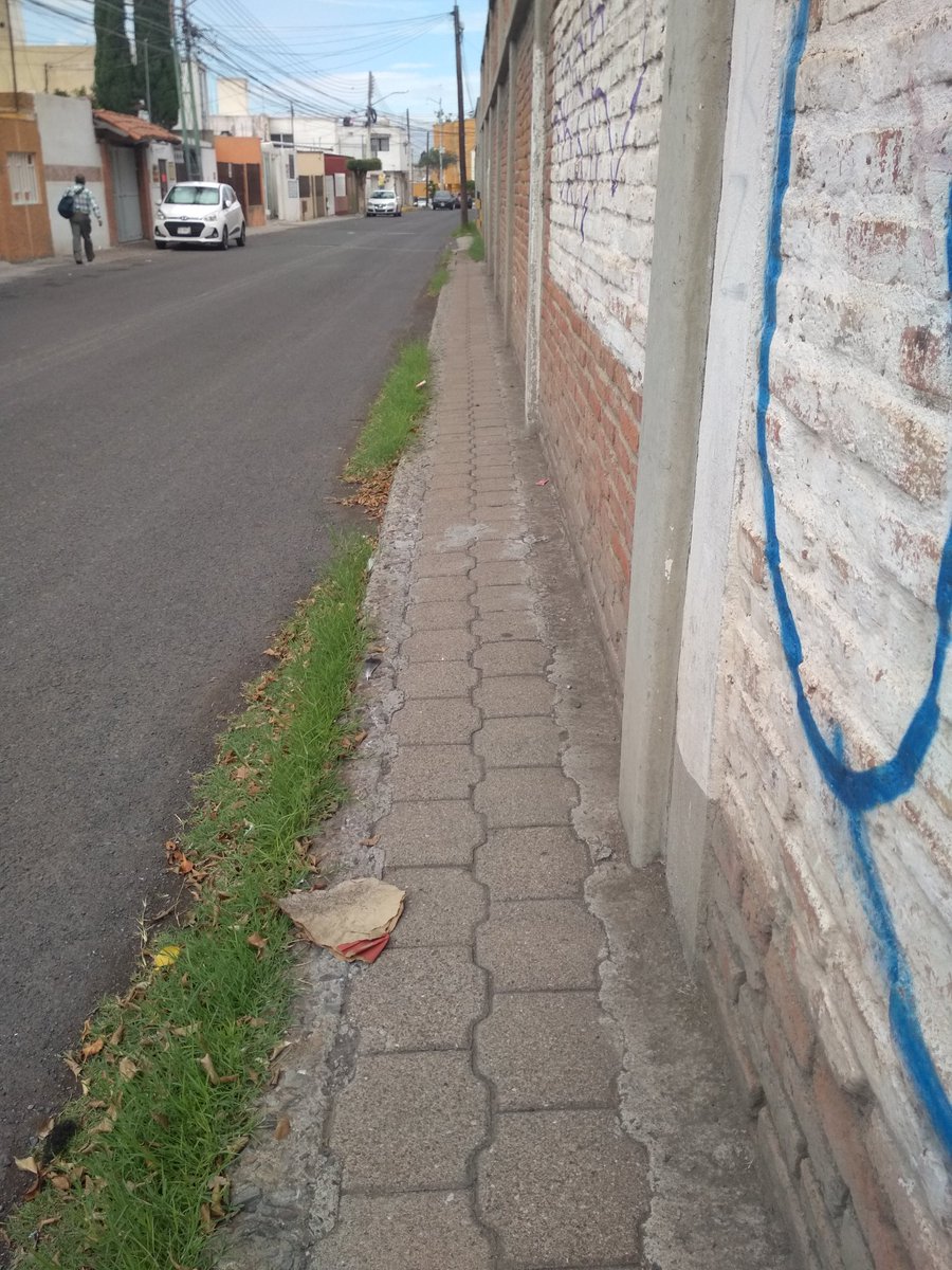 LizzQro's tweet photo. I live in a #city where the #streets are not for #pedestrians, they for cars, without sidewalks, and this "design" is intentional. #DefensiveDesign

Aftermath?  A city with a lot of cars, where you can't walk without the fear of been hit by a car. 
#NonInclusiveCity #Querétaro https://t.co/i5LGtWBRjh