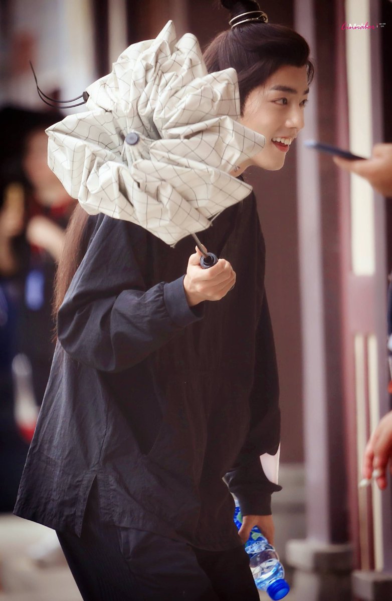 Xiao Zhan smiling cause he has the cutest smile a thread: