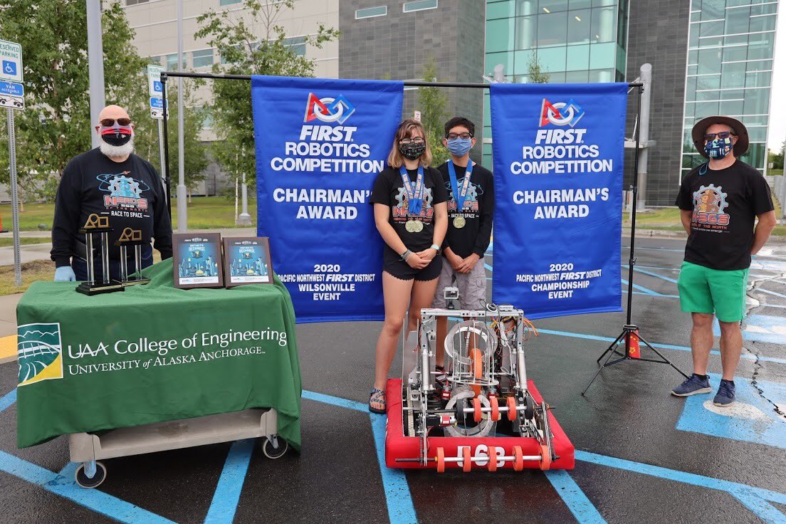 FRC568's tweet photo. New challenges call for creative solutions! We’re honored to have received the Chairman’s award, but we had one problem: how do you give out the awards in the time of Covid? The answer? Robots of course! Thank you to everyone who came to our drive-in chairman’s award ceremony 🤖 https://t.co/LmLNSbWY60