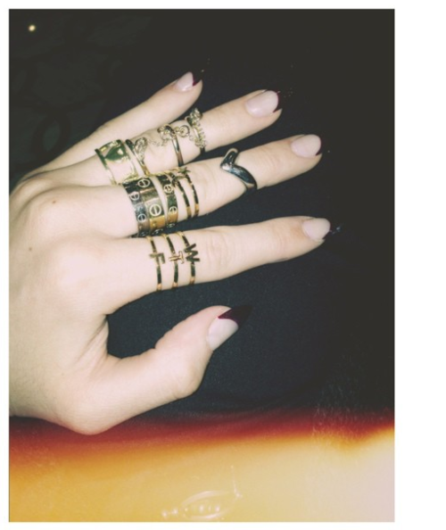 There's something she started to take to the next level with her new iPhone, editing apps and tastes: her nail selfies. The Cartier love bracelets were still there and STACKED on top of each other. Her hands looked like a supporting character in a Lana Del Rey video.