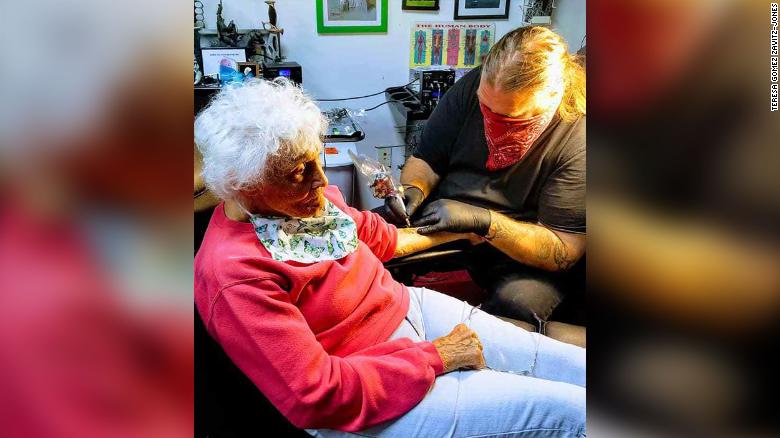 CNN's tweet photo. "All of a sudden, I decided I would like to have one. And if I could, a frog. Because I like frogs."

A 103-year-old woman got her first tattoo to cross it off her bucket list. https://t.co/WJ1ROpfJgc https://t.co/YBrAKkDQ9S