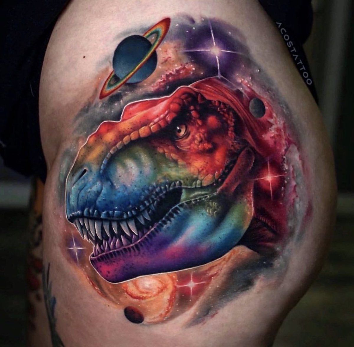darthlux's tweet photo. 3 sessions and i don’t even remember how many hours later, my rainbow space t-rex is finished! 🌈🪐🦖 artist is andrés acosta // @acostattoo https://t.co/1jZ7ZhjYn7