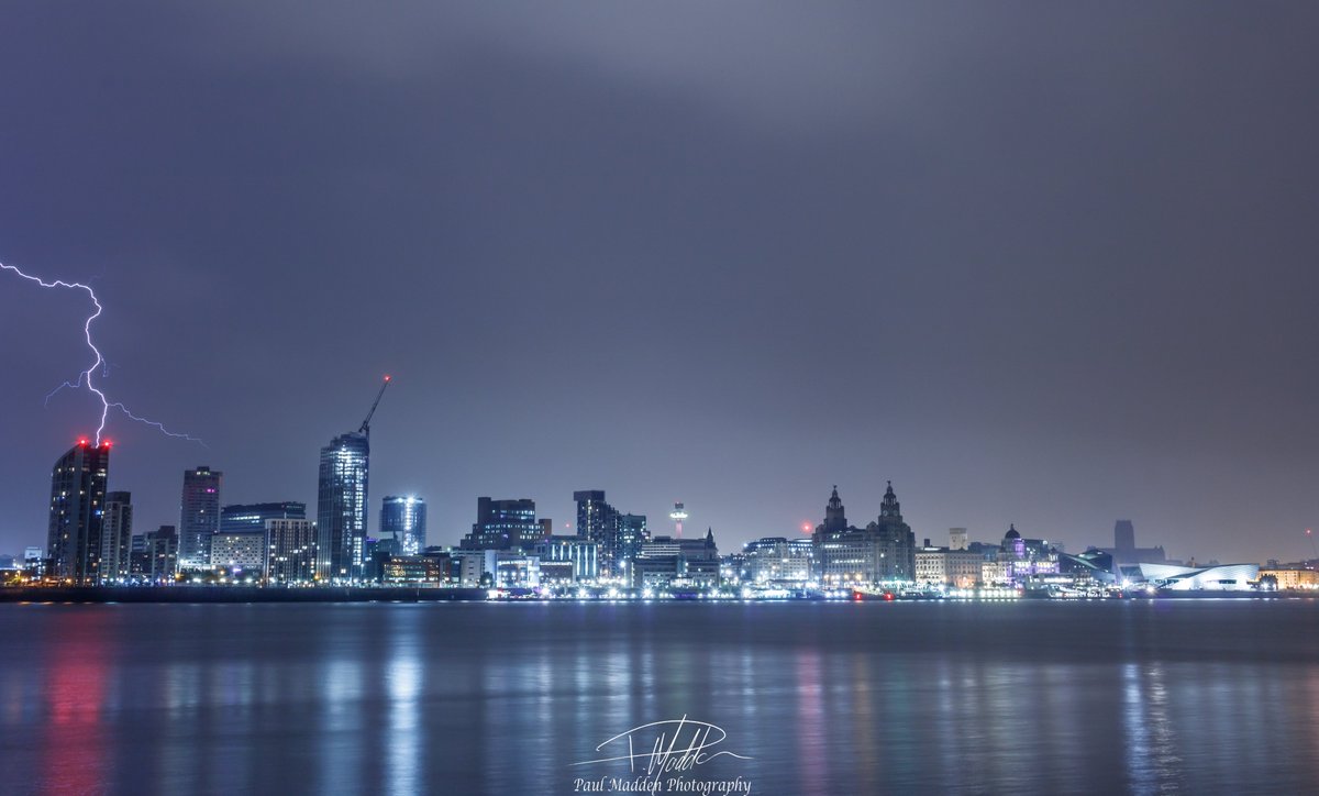 PaulMadden75's tweet photo. One lucky shot out of, well, a lot let's say. Lightning striking the Alexandra Tower on Liverpool waterfront seen from Seacombe on the Wirral. @BBCNWT @GranadaReports #lightning #storm #Liverpool https://t.co/lMvDwWiHc9