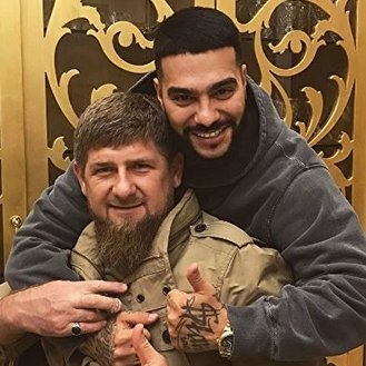 4/Same guy from the  music video. With Putin, Kadyrov, and boss of the Night Wolves.