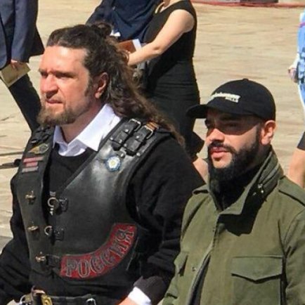 4/Same guy from the  music video. With Putin, Kadyrov, and boss of the Night Wolves.