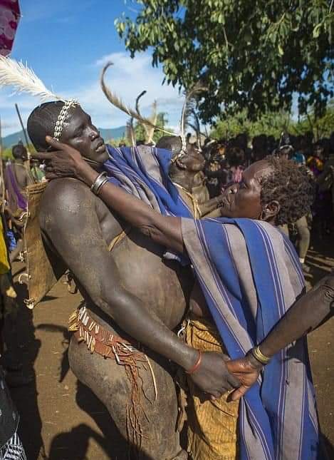 (3/3)... on the day of the competition, each of the 14 clans of the Bodi Tribe present their overweight unmarried male, for the rest of the community to judge. The winner takes huge glory, fame, and it increases his chances of finding a wife.