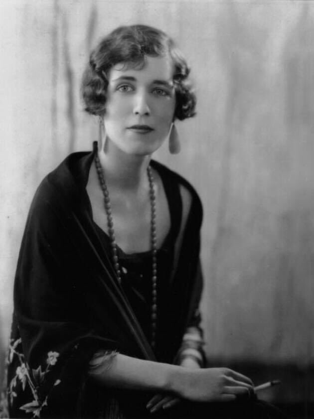 Women writers looking bored and holding a cigarette, part 42 in a series: Georgette Heyer
