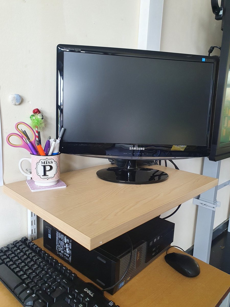 Miss_P85's tweet photo. My Miss P cup has made my new classroom feel a little more like home. #newschool https://t.co/GCXgmQ9Pf4