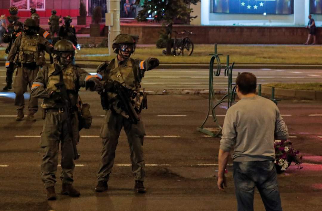 #Belarus: the streets of  #Minsk last night. One side carries flowers, the other sides carries guns