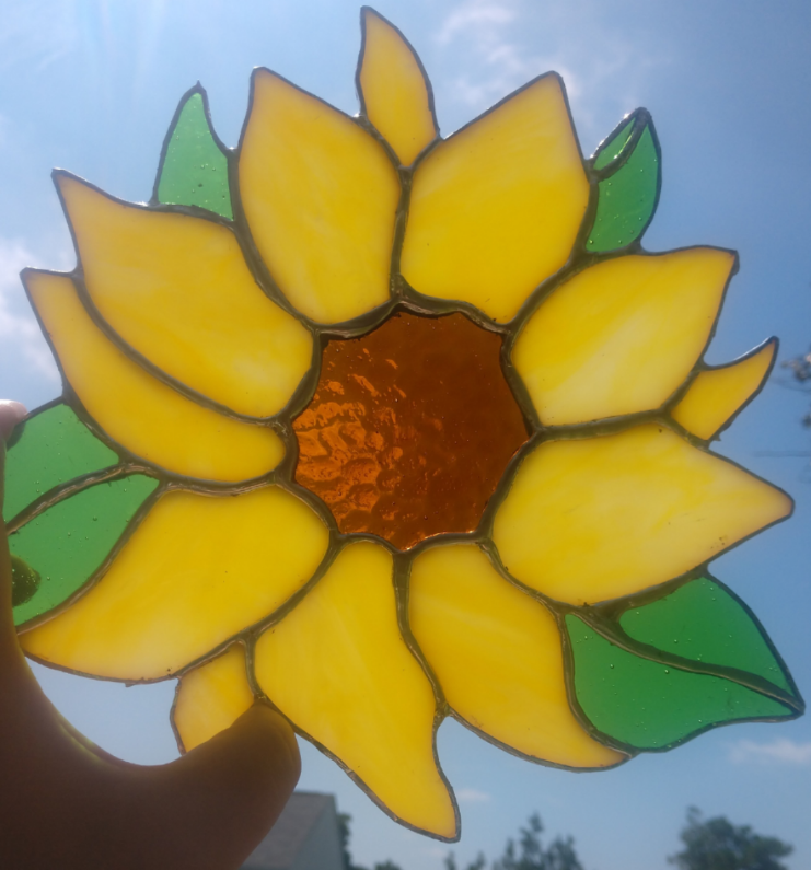 JenCorley1's tweet photo. I had so much fun making this #stainedglass #sunflower on my birthday! #wow #Beautiful ❤️🌻 https://t.co/zAaWb7PfFj