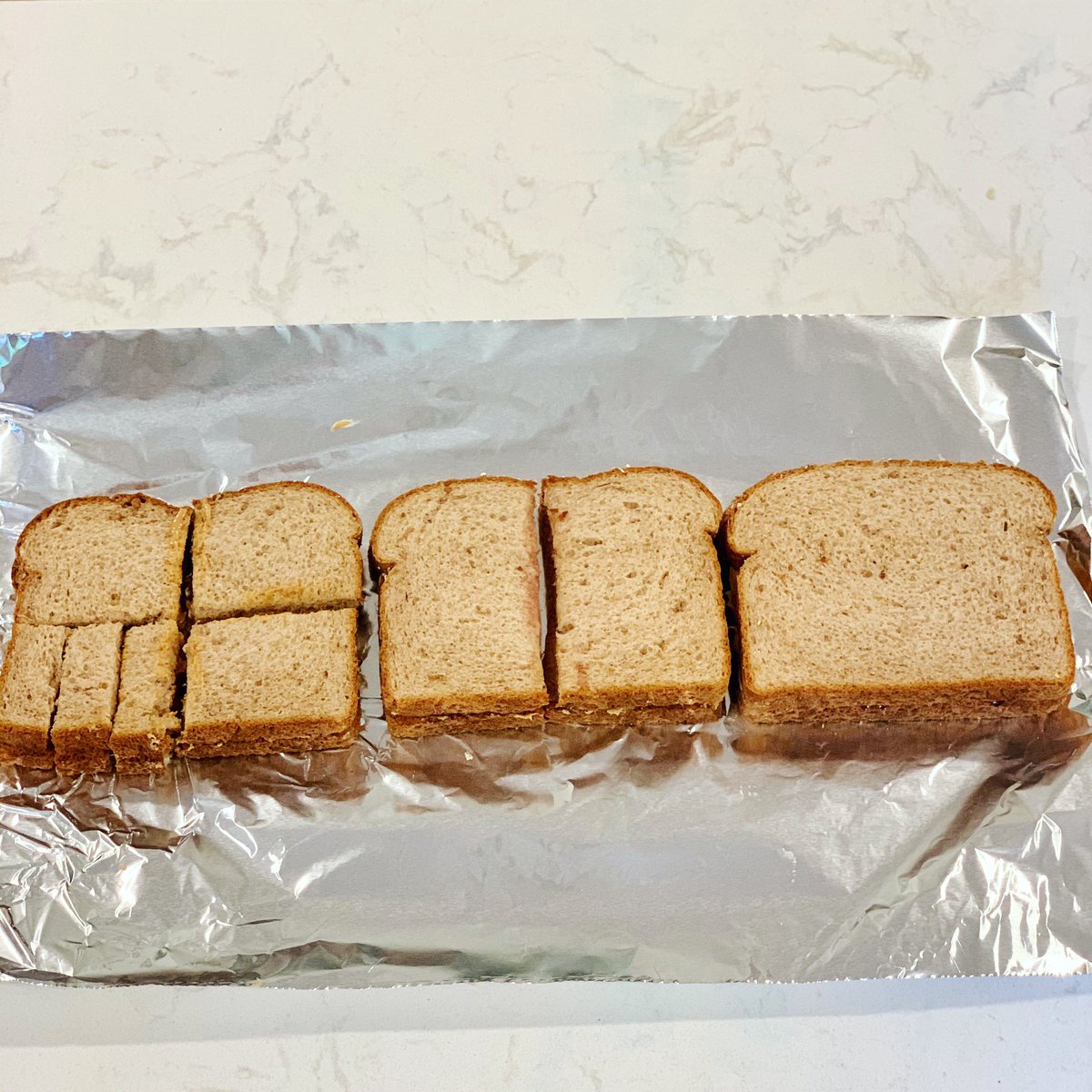 “I see math!”
Do you notice number (of whole sandwiches, of pieces cut, of pieces of bread)? Do you notice fractions? Do you notice shape? Do you wonder how much peanut butter was used to make these sandwiches? Do… instagram.com/p/CDwQPelhjTX/… #iteachmath #MTBoS #iseemath
