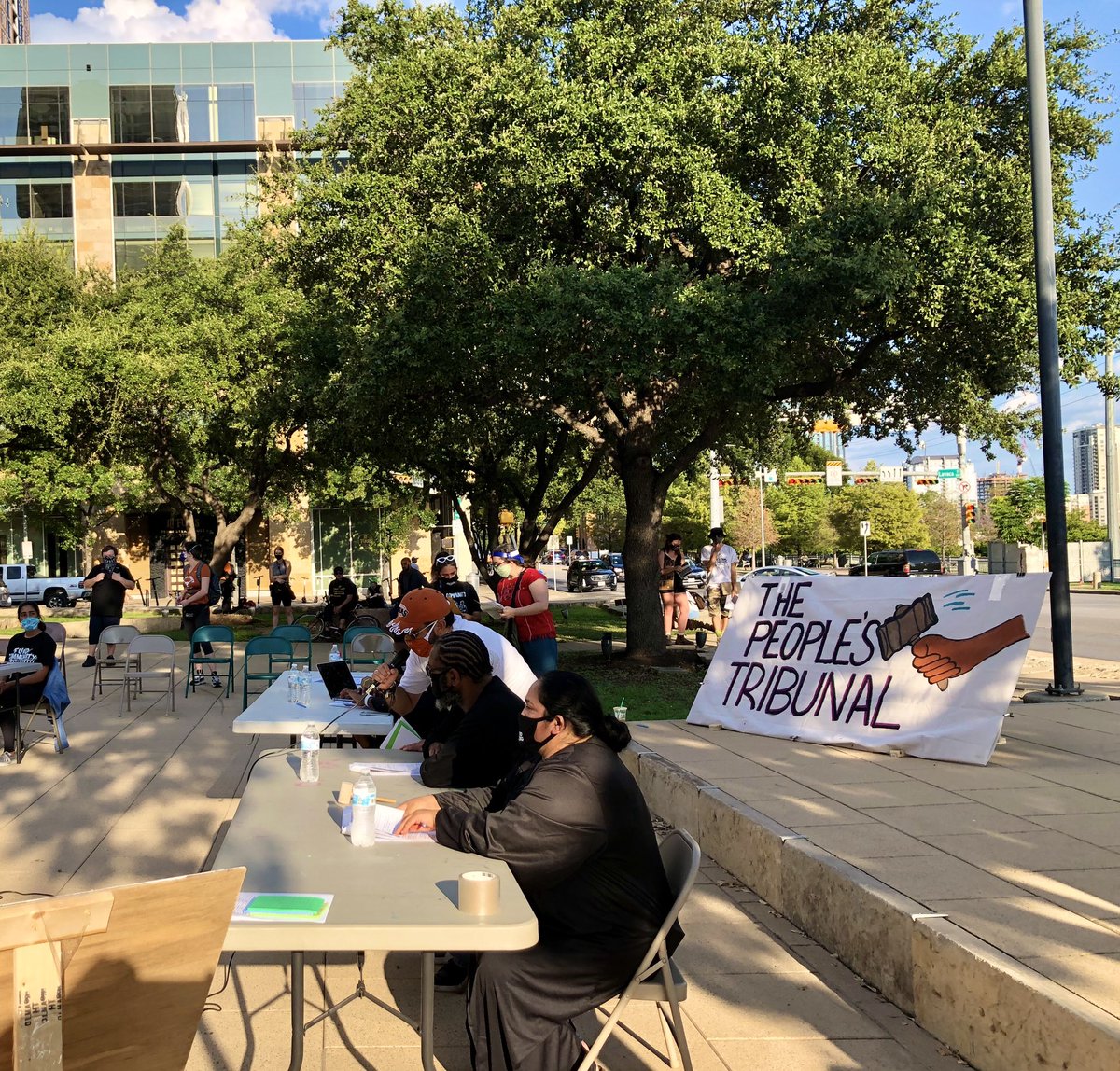 With  @Austin_DSA &  @atxliberation, we held a People's Tribunal outside City Hall.Directly impacted people gave evidence for charges of displacement, underfunding of public health, police brutality, & anti-immigrant policies & found the city guilty.  https://www.facebook.com/watch/live/?v=320098189143132&ref=watch_permalink 8/x