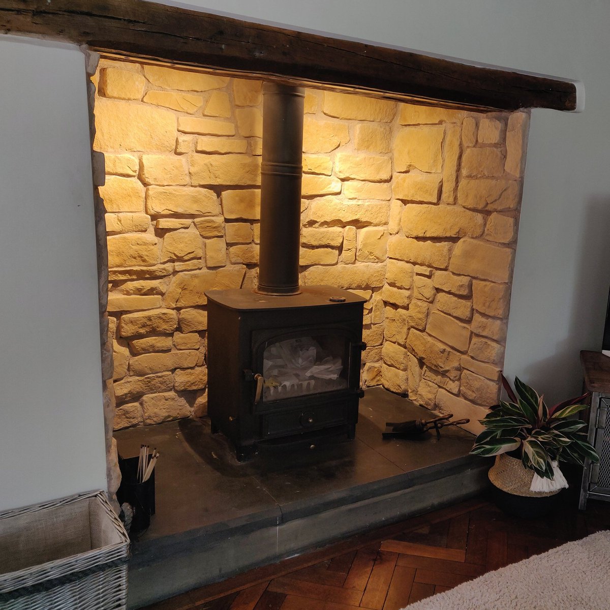 Our external Kopestone Buff pre cast stone slips used internally in a fireplace. Suitable around logburners. higginscladding.co.uk #fireplaceideas #logburnerenvy