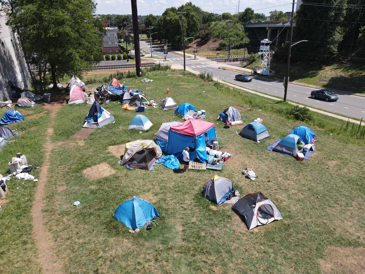 RoofAbove's tweet photo. Tent communities have been a reminder that some people do not have a home, and this has challenged our community’s consciousness. We've answered frequently asked questions about the encampments, and shared how to help end homelessness in Charlotte. https://t.co/z8fErIu79L https://t.co/QPDXT0b5yU