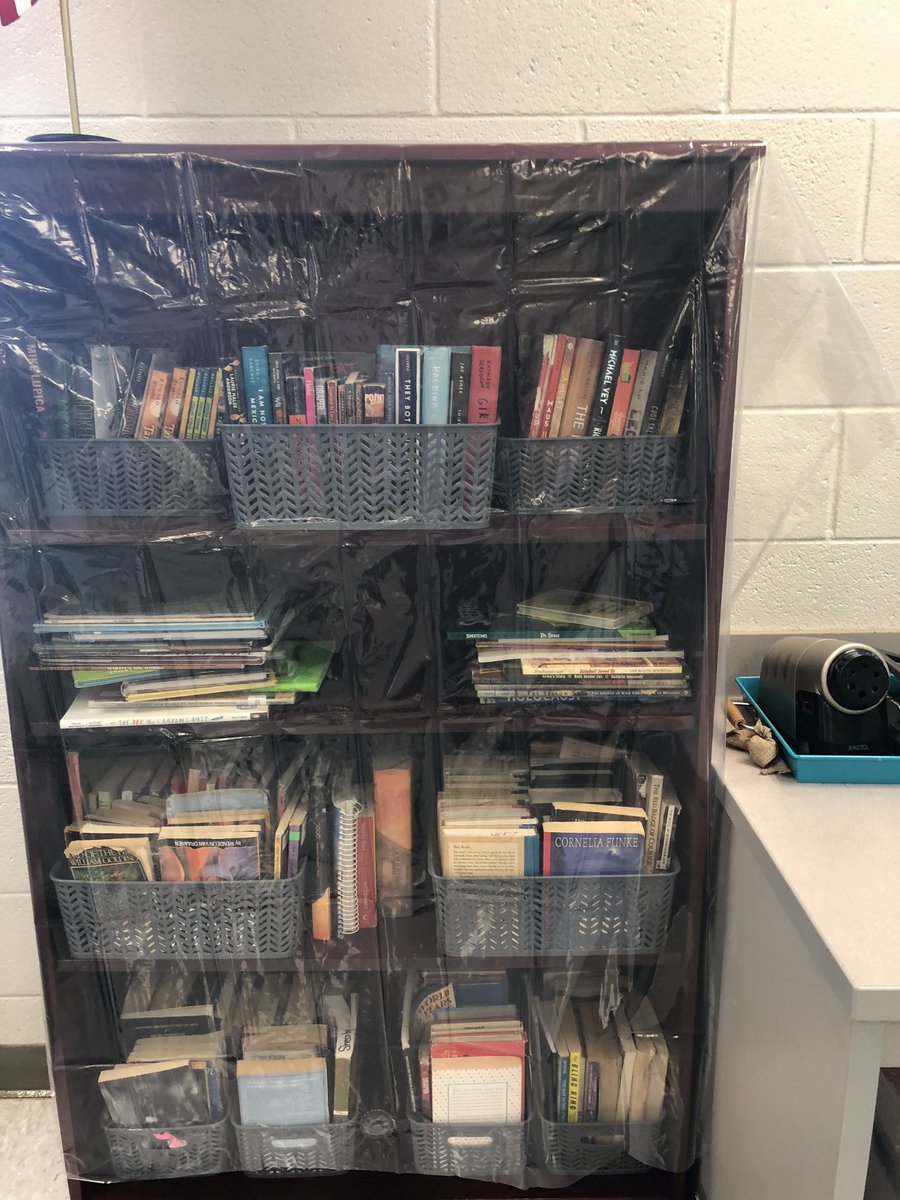 lesleymsnyder's tweet photo. Never did I ever think I’d be covering my classroom library with a shower curtain 😅 https://t.co/SRFfdsv0SA