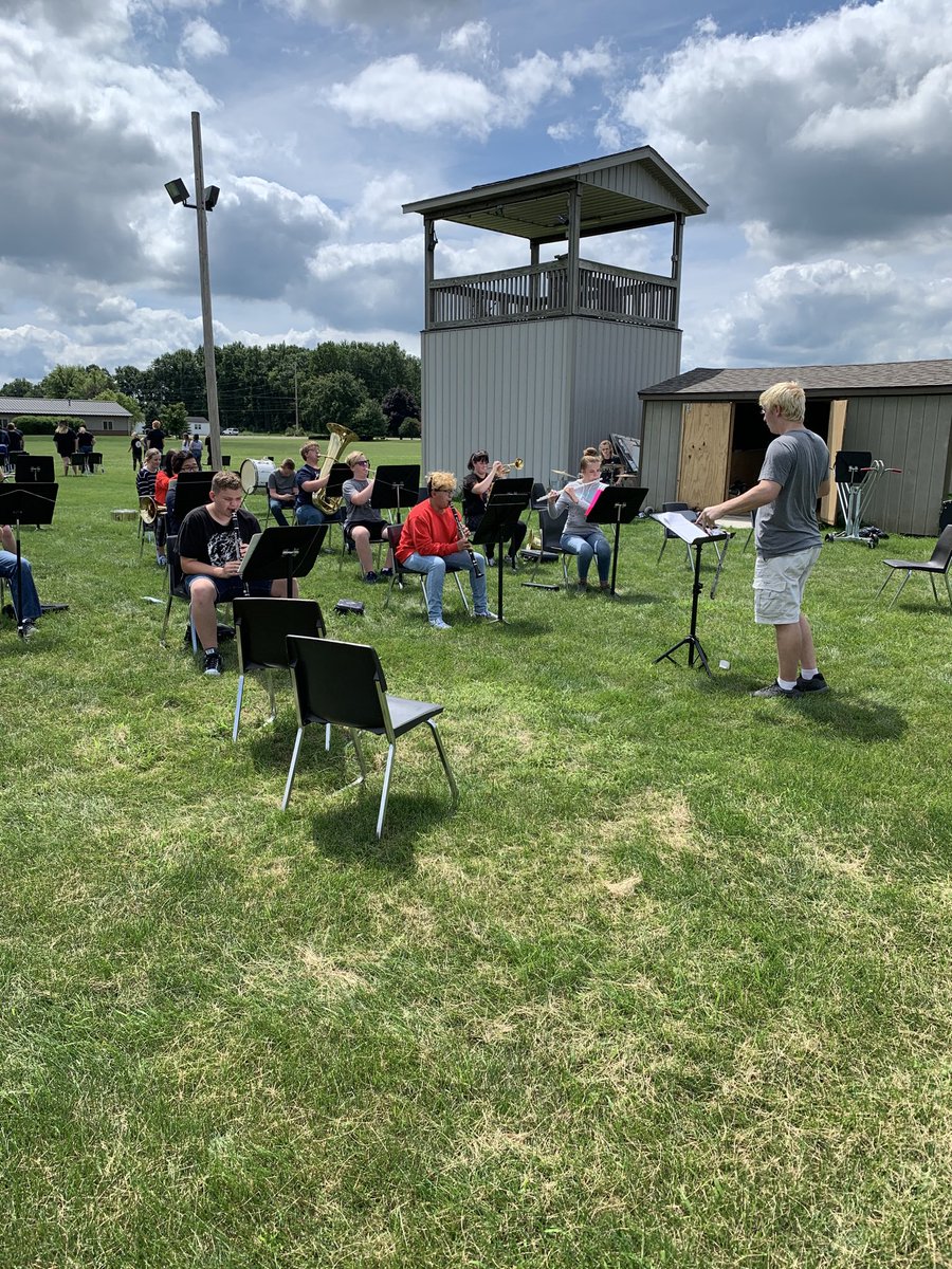BengalBDirector's tweet photo. Choir &amp; band isn’t letting the constraints of a roof and four walls to keep music education from taking place #GettinErDone #bhmsd https://t.co/ShKB2uXUQ8