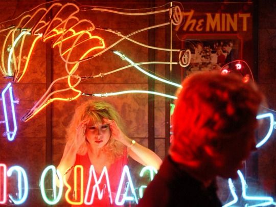 One From The Heart, cinema neon, Teri Garr looking through glass