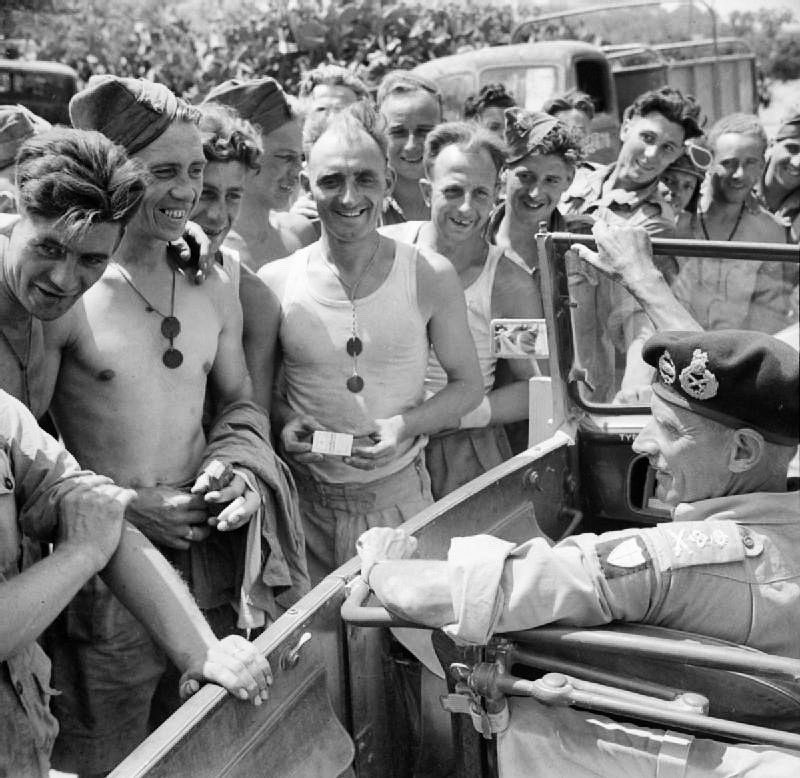 HistoriumPod's tweet photo. General Montgomery stops his car to talk to the men of the Royal Engineers working on a road near Catania, Sicily in August of 1943. #history #ww2 #war #soldiers #royalengineers #sicily #generalmontgomery #forties https://t.co/Ja7ahNdafn