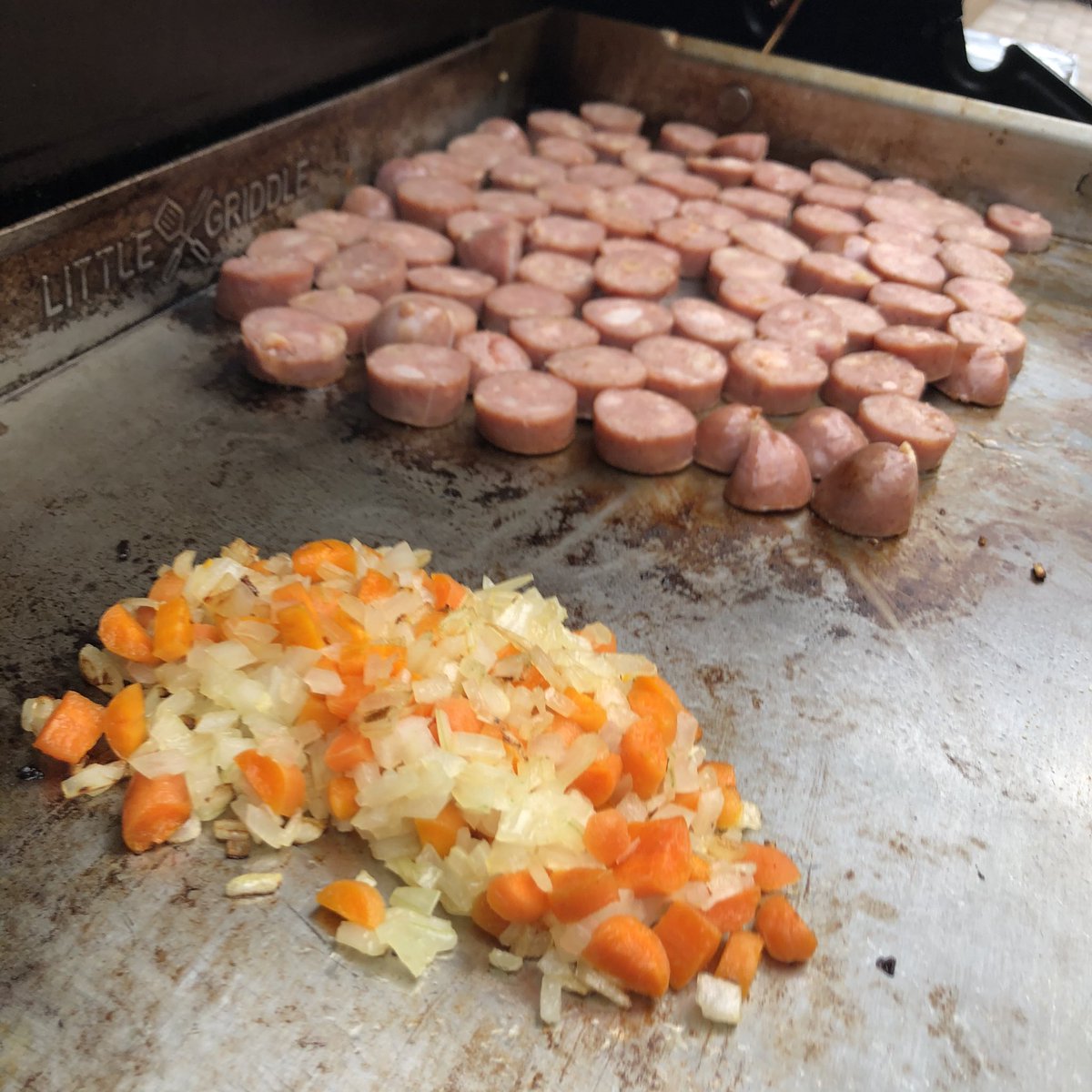 Next, cook the meats! (If you’re a vegetarian you can skip this part). Once your meats are looking seared and all-the-way-cooked, relocate them to a bin and cover ‘em up.Fam’s in town, so we had pineapple-chicken sausages.