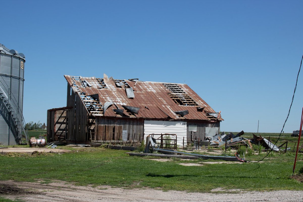 Various grain bins and farms destroyed from violent winds from between Perry, IA, and Huxley for the next couple of slides. Cornfields FLATTENED.