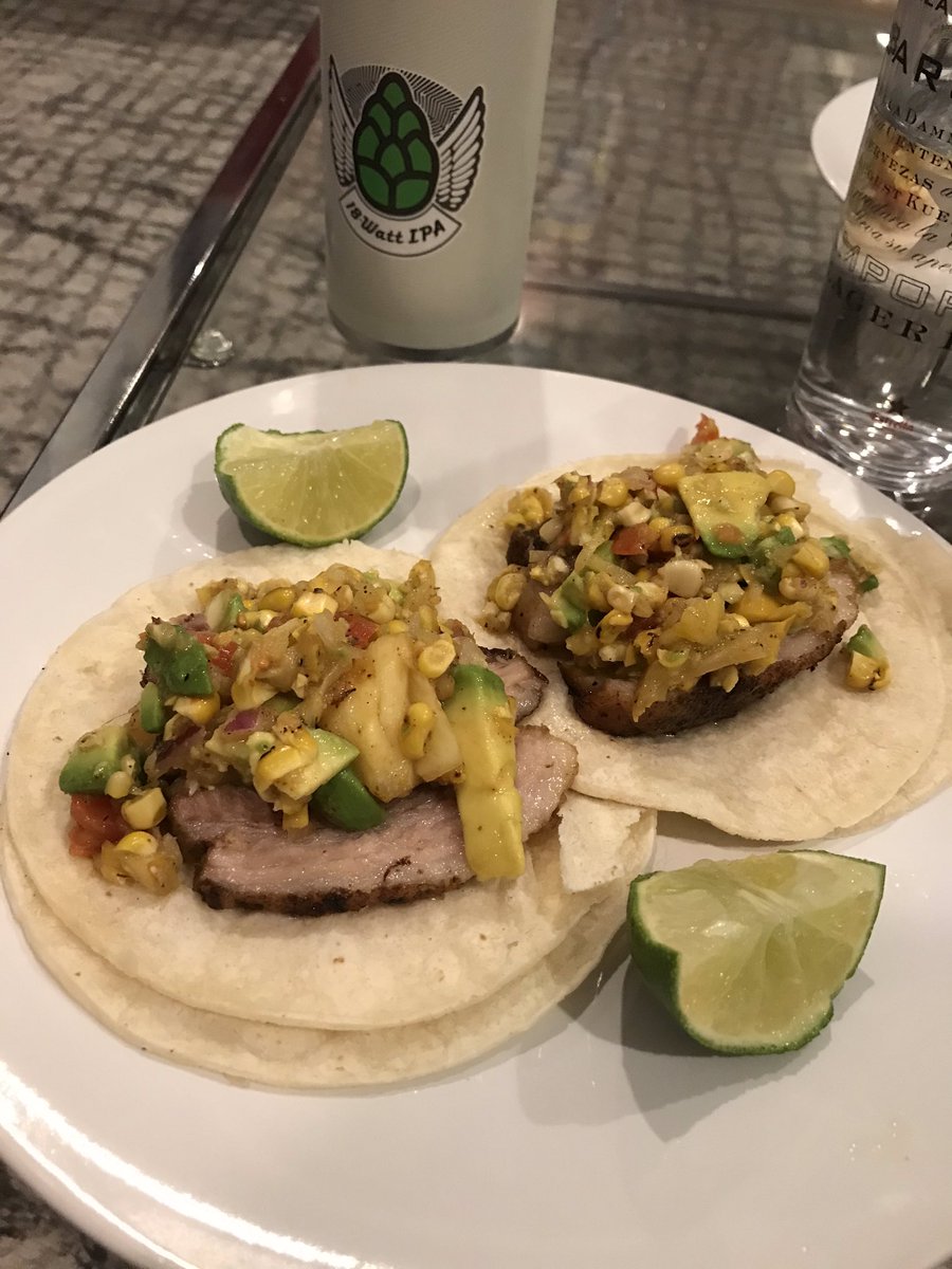 Ancho chile pork belly tacos with grilled pineapple mango corn salsa 