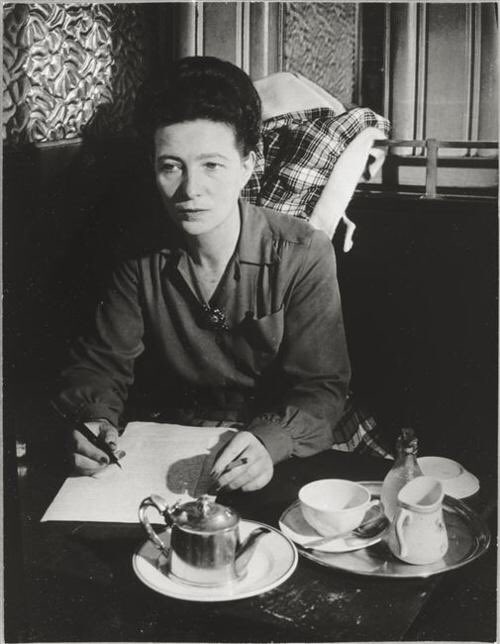 Women writers looking bored and holding a cigarette, part 65 in a series: Simone de Beauvoir