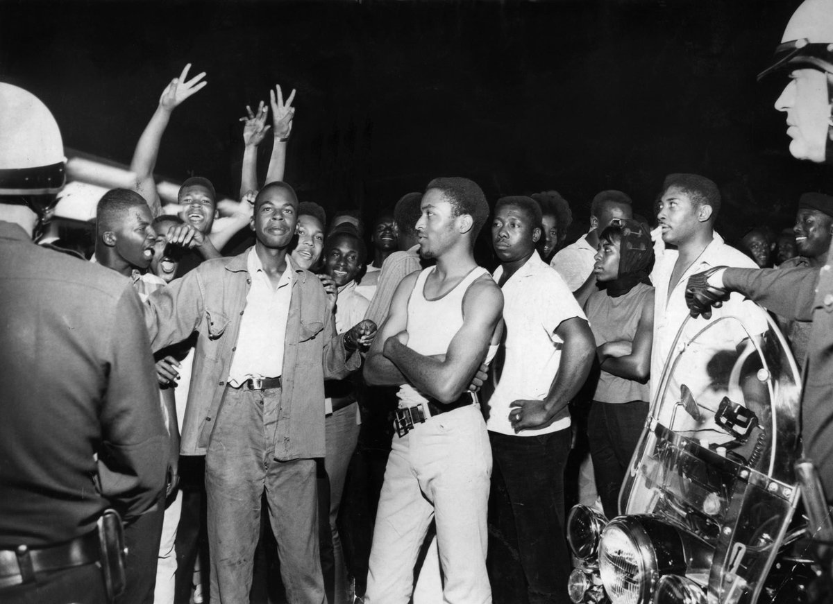 Aug. 12, 1965: The scene at Imperial Highway and Avalon Boulevard in the early morning just before violence broke out. (Don Cormier / Los Angeles Times) https://www.latimes.com/local/lanow/la-me-ln-watts-riots-explainer-20150715-htmlstory.html