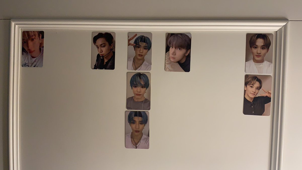 Current photo cards on display with spaces left for taemin and Lucas. I already pulled a taemin photo card but gave him to my bff because she loves him dearly. (Missing an album because I gave my friend the CD but I kept the photo card cause I love mark)