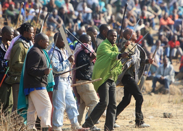 Tyrone_Mkansi's tweet photo. Cyril Ramaphosa had 9% of Lonmin’s shares and he sat on its board as a non‑executive director. He could have argued for negotiation on behalf of the miners. Instead he argued for the police to move in and kill 34 miners. MURDERER  #RememberMarikana https://t.co/iYRtn7OHcx