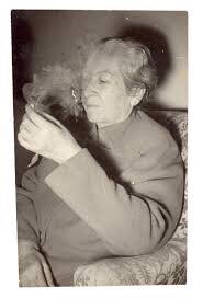 Women writers looking bored and holding a cigarette, part 67 in a series: Gabriela Mistral