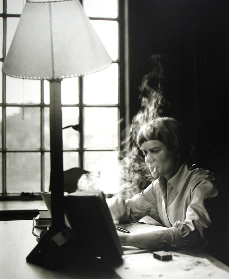 Women writers looking bored and holding a cigarette, part 69 in a series: Iris Murdoch
