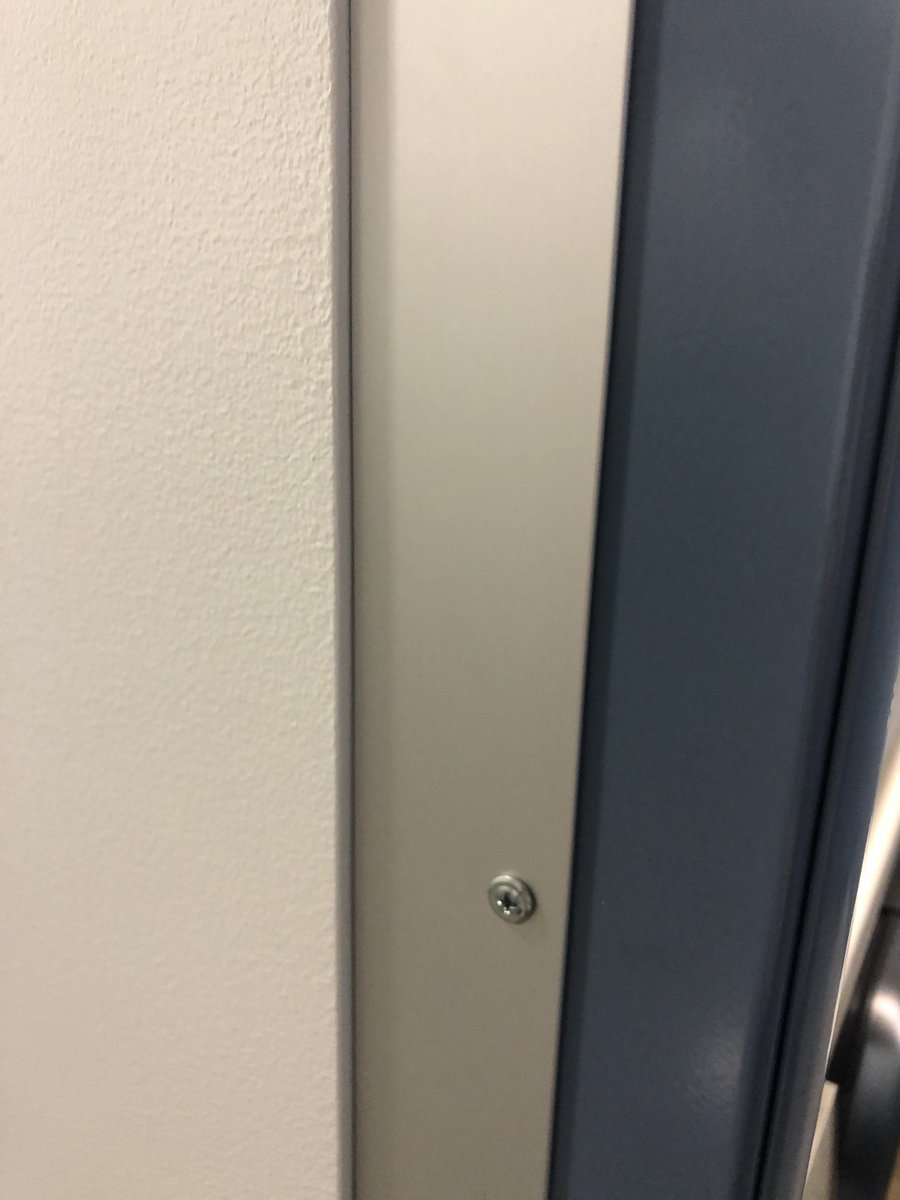 I just used the ladies room for the first time today... brand new piece of metal closing the gap.