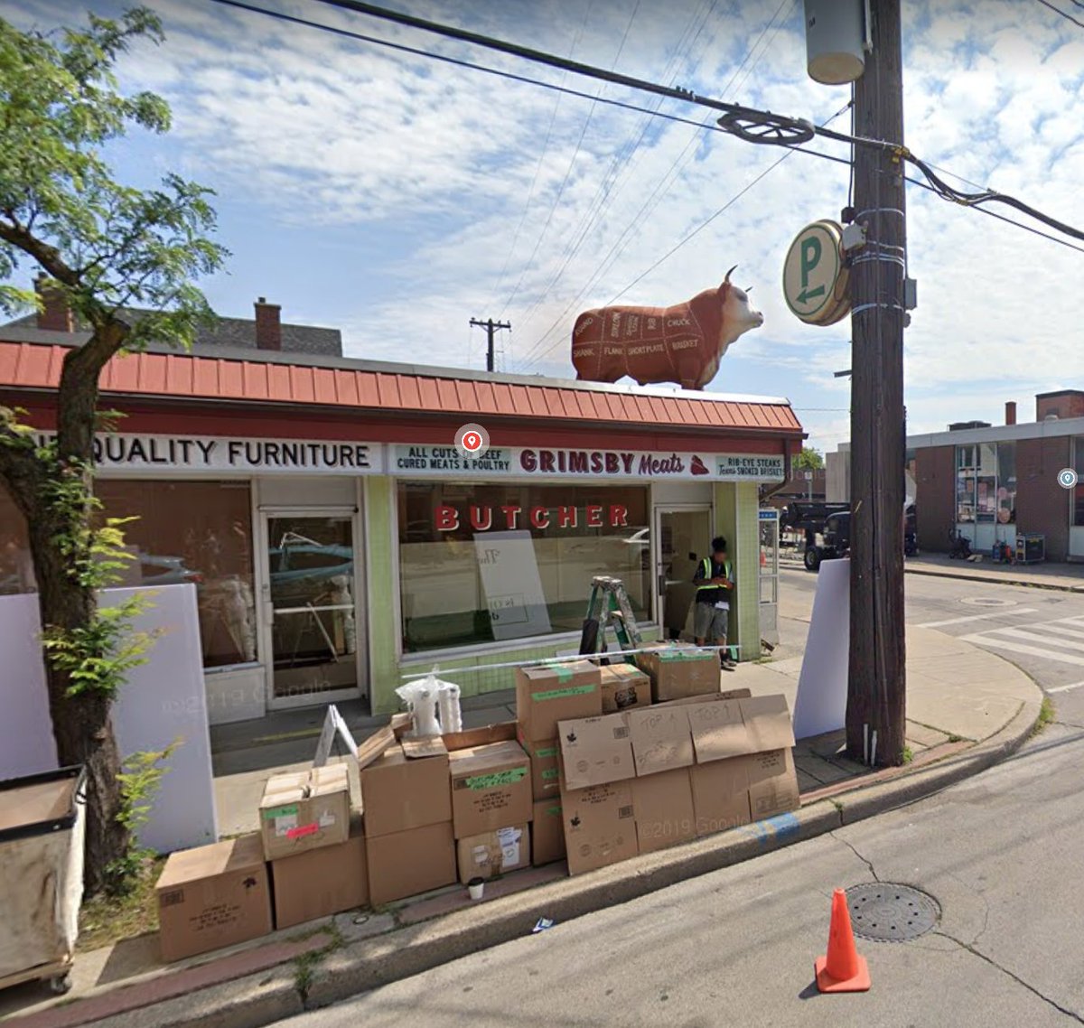 For example: the butcher shop you see featured in S2 has a cow on top of the roof. Coralie had to call the landlord of the Painted Bench on Ottawa Street (the IRL store) to ask for permission to place the cute bovine on top of their shop.