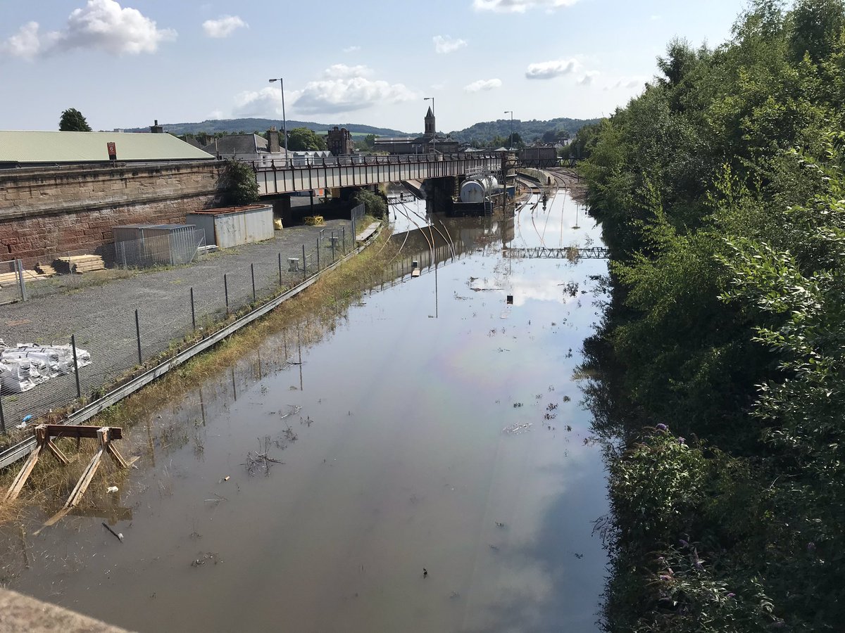 davidanderson3's tweet photo. This is the rail line into Perth Train Station from Inverness today after amazing storm last night. #flood #storm #scotrail https://t.co/HcDJ5y9eq0