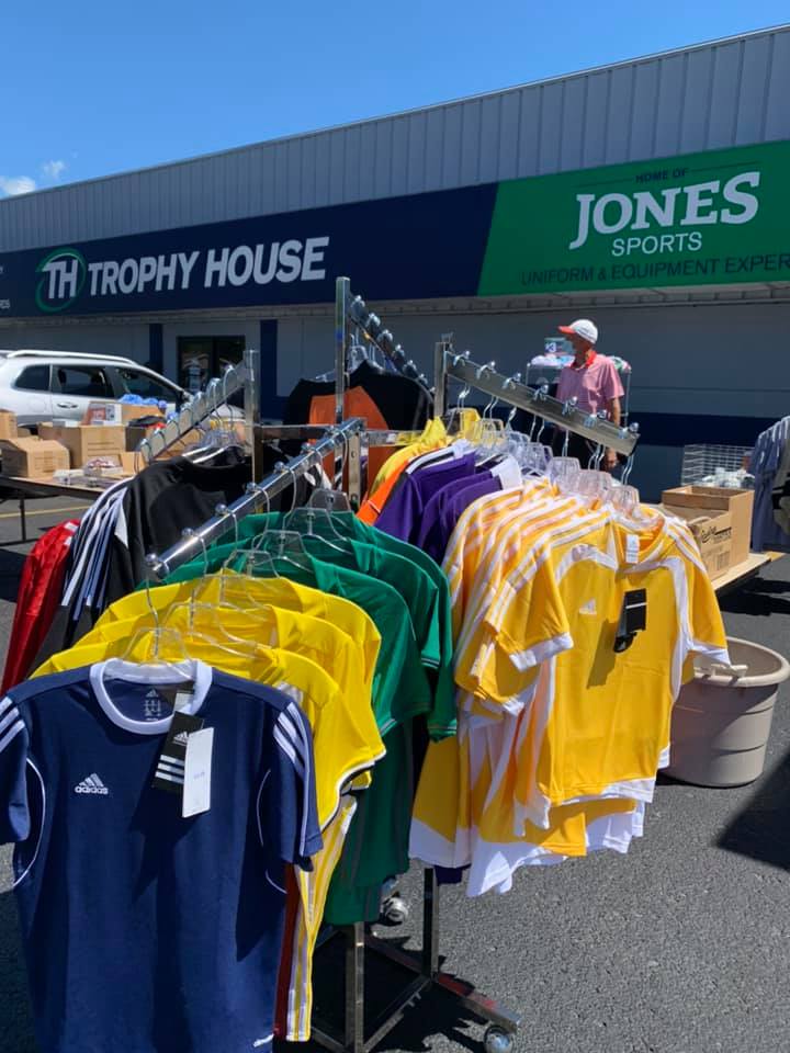 Shop our summer clearance sidewalk sale. 
🏀🏈🏅🧢🎒
Going on now! Get up to 75% off. Plus we are your local resource for custom school masks and gaiters. Stop in our showroom today!