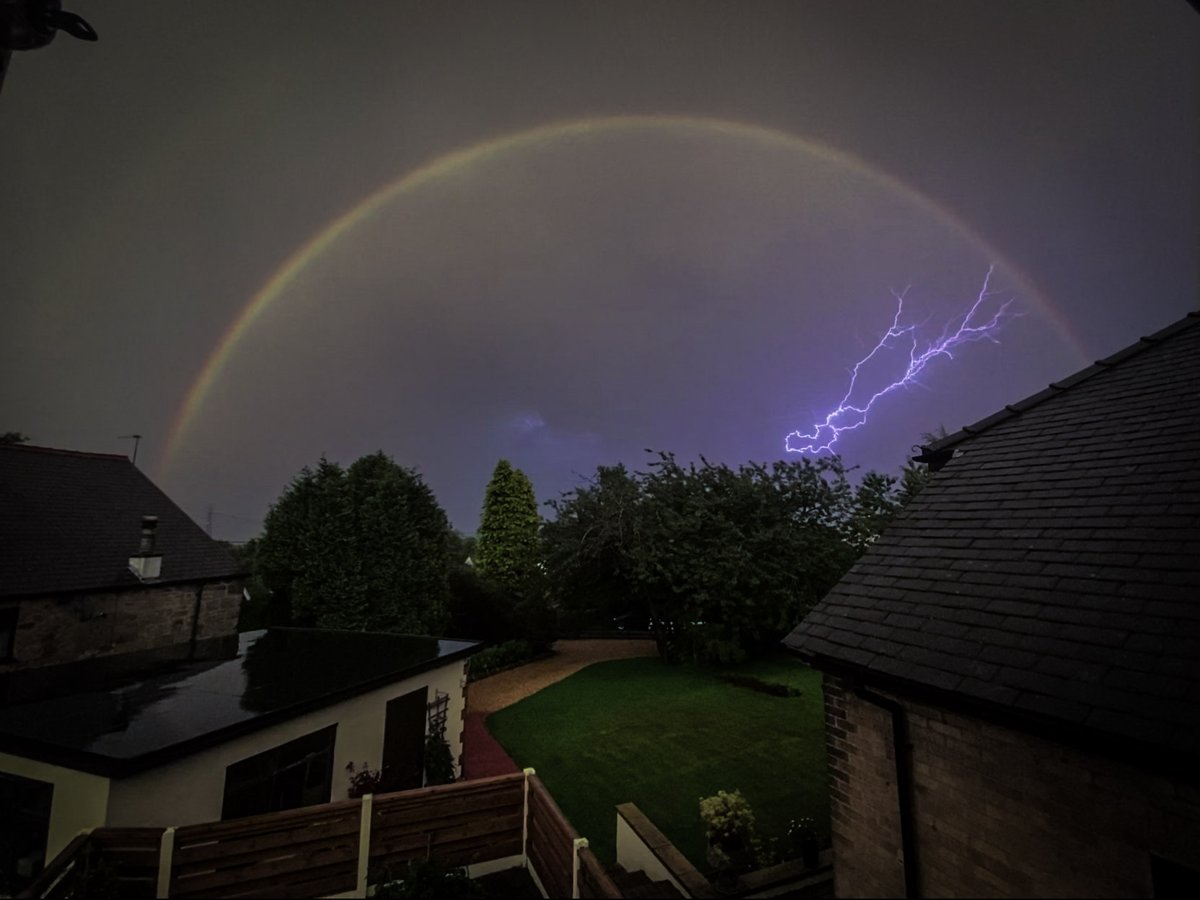 NXRZL's tweet photo. Edited a photo of lightning from #StormUK over @wrexham "touching" a rainbow! 

Included edited and non-edited

#thunderstorm #lightning #lightninguk https://t.co/WtzgrIIpqj