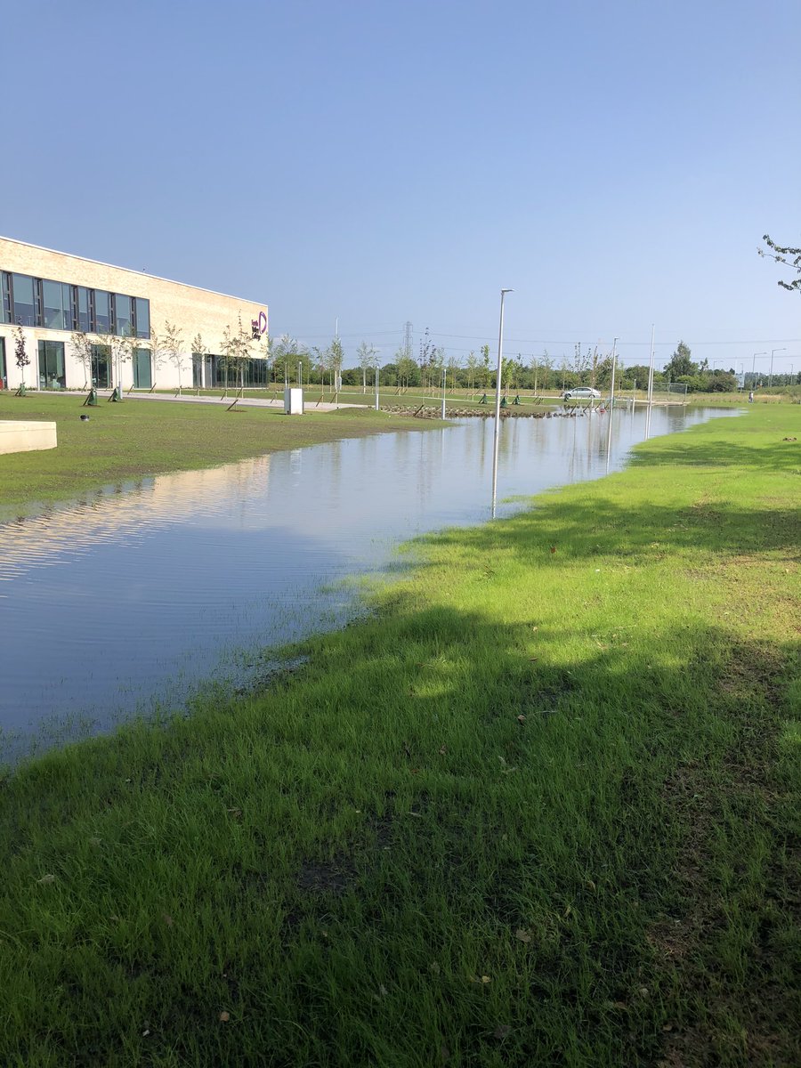 The path at the new built and very high tech looking Forth Valley College. Someone wants to tell the contractors that built the path that they’ve forgot to put drainage in and the slopes down on either side into a kind of bowl.