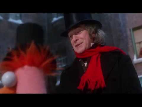 "But Scrooge dresses all in black!" Yes, and he's an elderly miser. He doesn't give a shit about being in fashion. To paraphrase the book and movie, "Black is cheap, and Scrooge liked it fine." (Notice how that when he reforms, he gains a red scarf!)