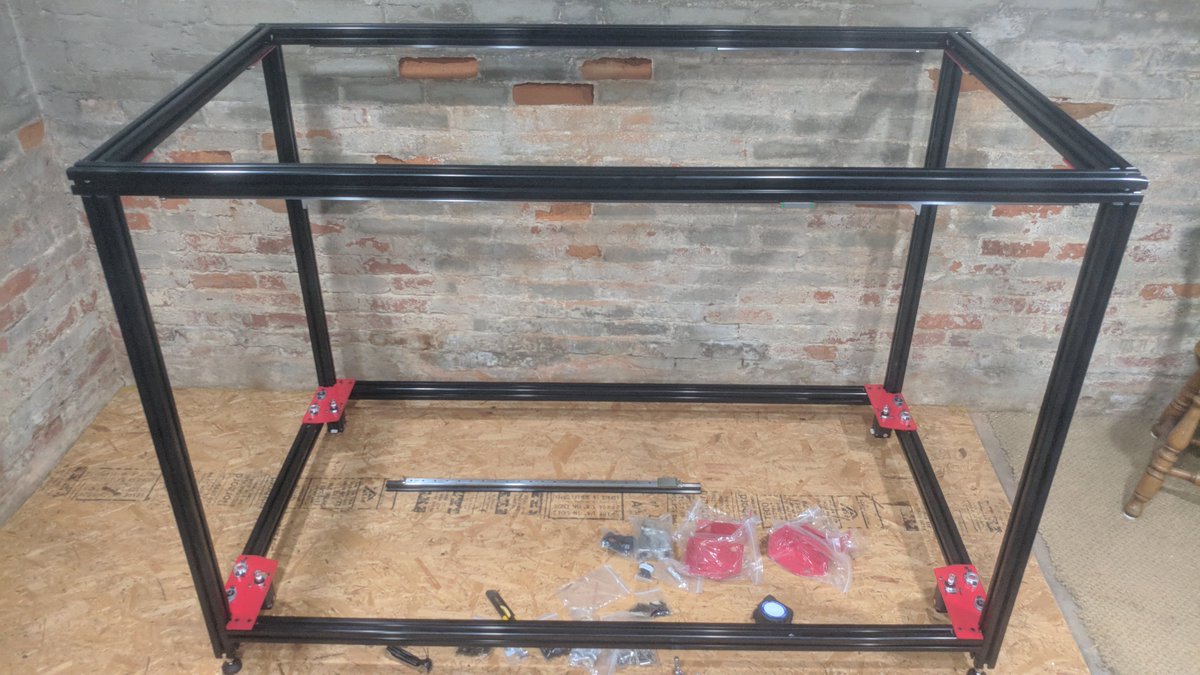 Burningems's tweet photo. We got the rails and guide rod mounts on the #modix 120x. Just a little at a time but I got the crew helping. #turnthescrew #3dprinter #buildit #kids https://t.co/bAI7huJkZ3