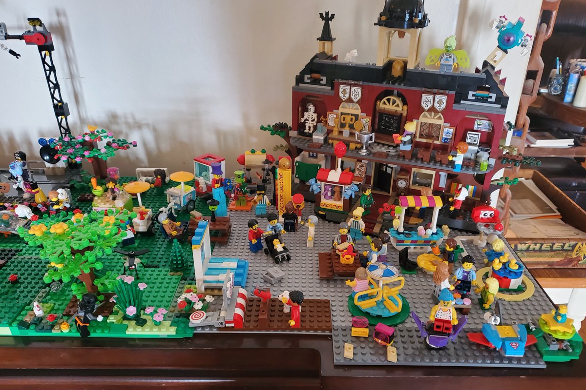 Here is part of the  #KHive village so far. Some of this will change. I've got plans for a concert, on one side you can see a fair going on now. I plan on doing a Hillary minifig as well as one for Doug Emhoff, Nancy Pelosi and Dr. Jill Biden and other political figures.(6/)