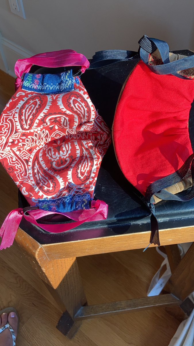 swelow's tweet image. Sometimes it is good to be short and frugal... using fabric from the shorten leg pants 😊. The inside is an old bandana &amp;amp; a dollar store t-shirt. They made some cute masks! #reuse #WearAMask #newSewingMachine