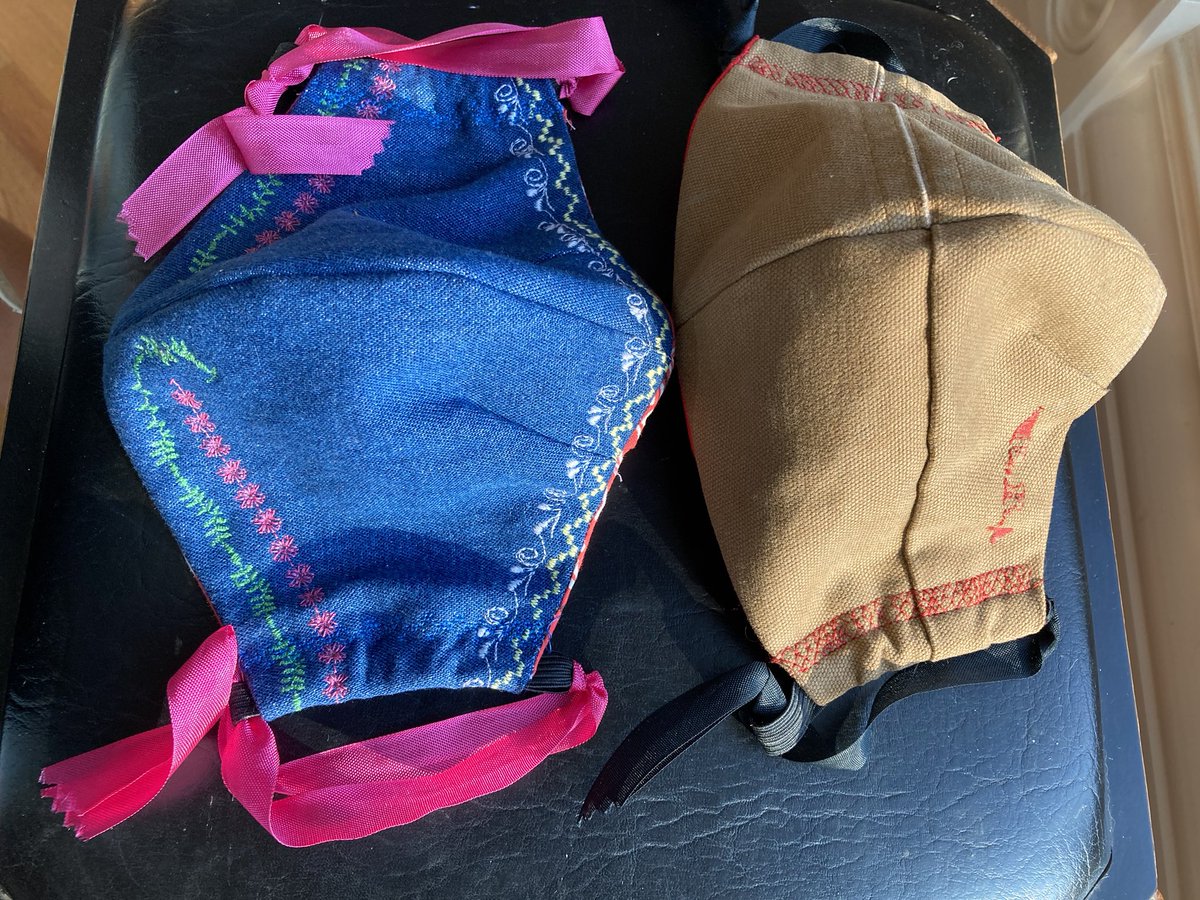 swelow's tweet image. Sometimes it is good to be short and frugal... using fabric from the shorten leg pants 😊. The inside is an old bandana &amp;amp; a dollar store t-shirt. They made some cute masks! #reuse #WearAMask #newSewingMachine