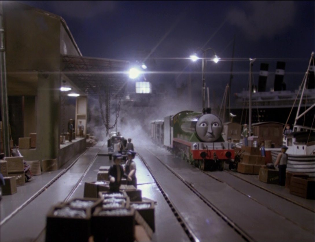 The big harbours in Seasons 1 and 4 are Knapford. In Fish, it's directly called "the harbour at the Big Station by the sea" aka Knapford. Main line and Thomas' branch both service this. Henry collects the Kipper here, Stepney collects stone here, Percy loads Bulstrode here, etc.