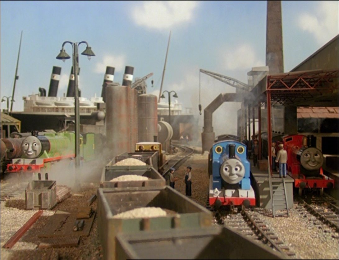 The big harbours in Seasons 1 and 4 are Knapford. In Fish, it's directly called "the harbour at the Big Station by the sea" aka Knapford. Main line and Thomas' branch both service this. Henry collects the Kipper here, Stepney collects stone here, Percy loads Bulstrode here, etc.