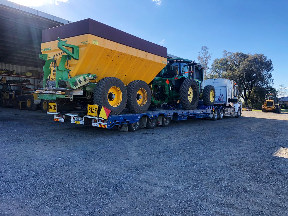 YFCcontracting's tweet photo. How good are tuff trailer tilt’n’slide. No ramps mean getting a 3m wheelbase tractor and spreader on is perfect 👌. Off to another gypsum spreading job before the next rain. This setup would be great to move tractor/bin combos for upcoming harvest. Call on 0409080409  👍 https://t.co/rfyMnJQQB2