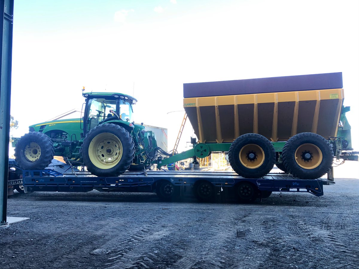 YFCcontracting's tweet photo. How good are tuff trailer tilt’n’slide. No ramps mean getting a 3m wheelbase tractor and spreader on is perfect 👌. Off to another gypsum spreading job before the next rain. This setup would be great to move tractor/bin combos for upcoming harvest. Call on 0409080409  👍 https://t.co/rfyMnJQQB2