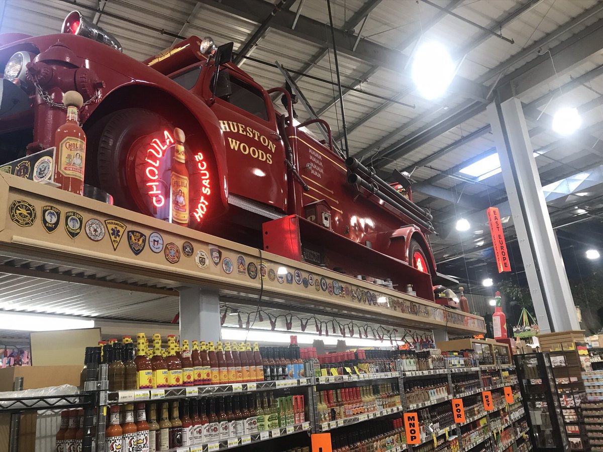 Hot sauce? Of course they have hot sauce, AND what better way to know where you are then a vintage fire truck over the whole hot sauce aisle