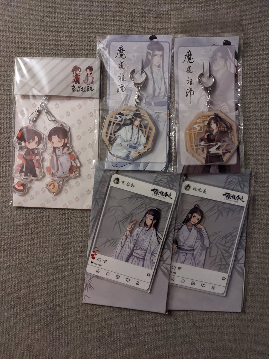 Prize E: Acrylic Charm/Keychain SetPrize F: CQL Q Acrylic Standee (Pick 3)Prize G: Button & Assorted Items Set