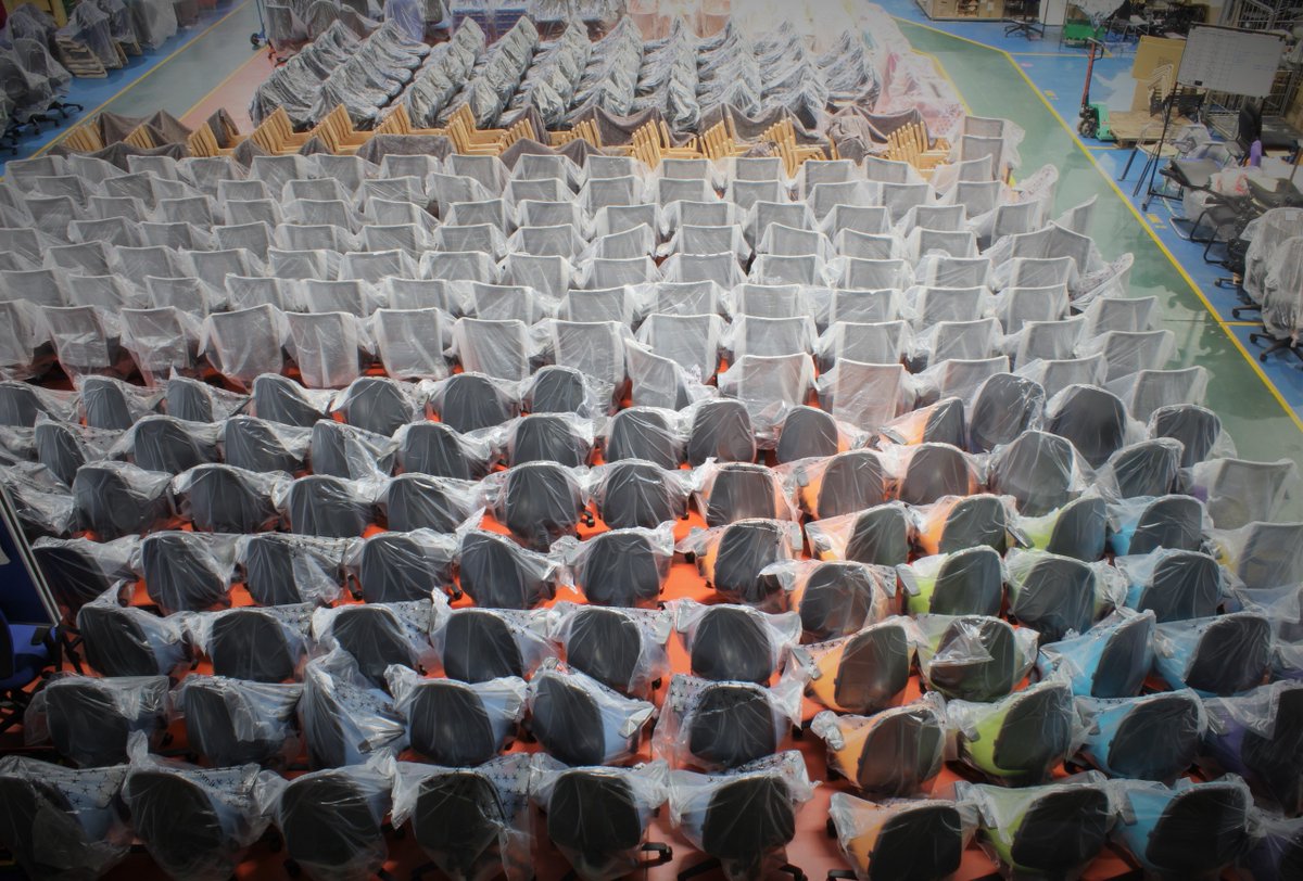 summit_1977's tweet photo. Interesting landscape this morning. Colourful selection of #operatorchairs for a school at the back. Lots of #meshbackedchairs in front, again for school. Anti Bacterial, Wooden frames ready for #healthcare and finally 450, indestructible SK10 Mega Chairs https://t.co/Dke5FCYifE https://t.co/ziJjnXwNqG